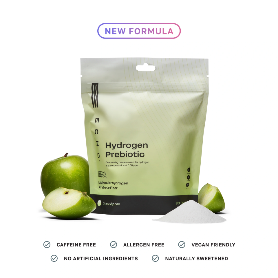 Hydrogen prebiotic powder new formula in green apple flavor, with apple slices and powder pile