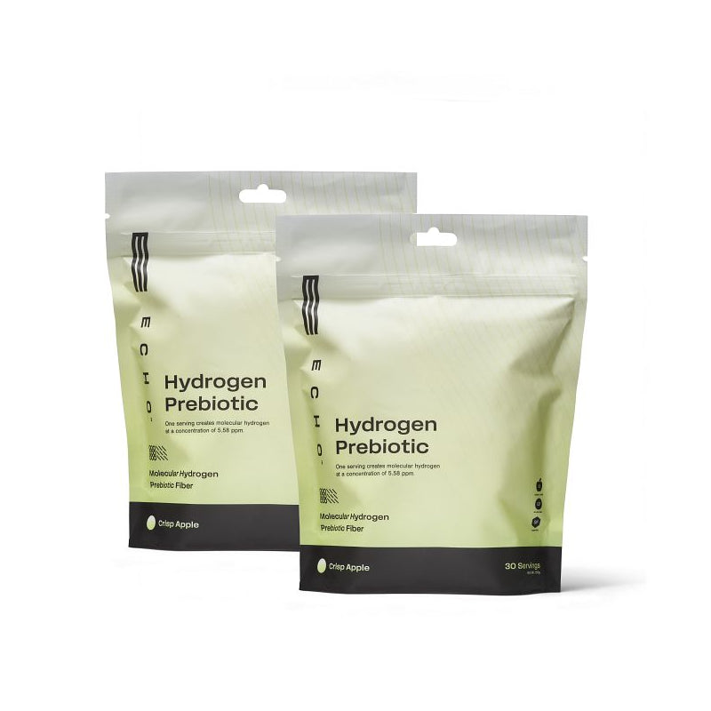 Two pouches of hydrogen prebiotic supplement crisp apple flavor, front view on white background