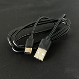 Black USB-A to USB-C charger cable on a black background