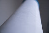Close-up of a textured white water filter cartridge, used in hydrogen water systems