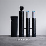 Advanced hydrogen water filtration system with four black filter units on gray background