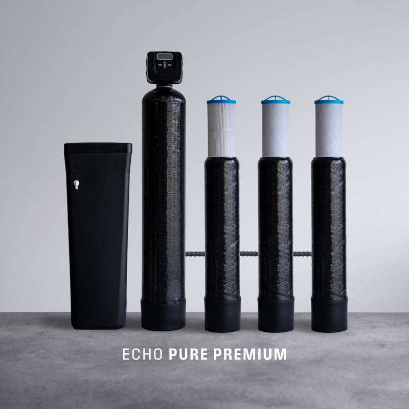 Hydrogen water filtration system with black tanks and filters on a gray background