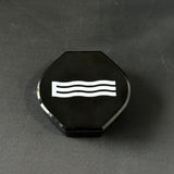 Black octagonal plastic lid with white wave design, replacement part for hydrogen water device