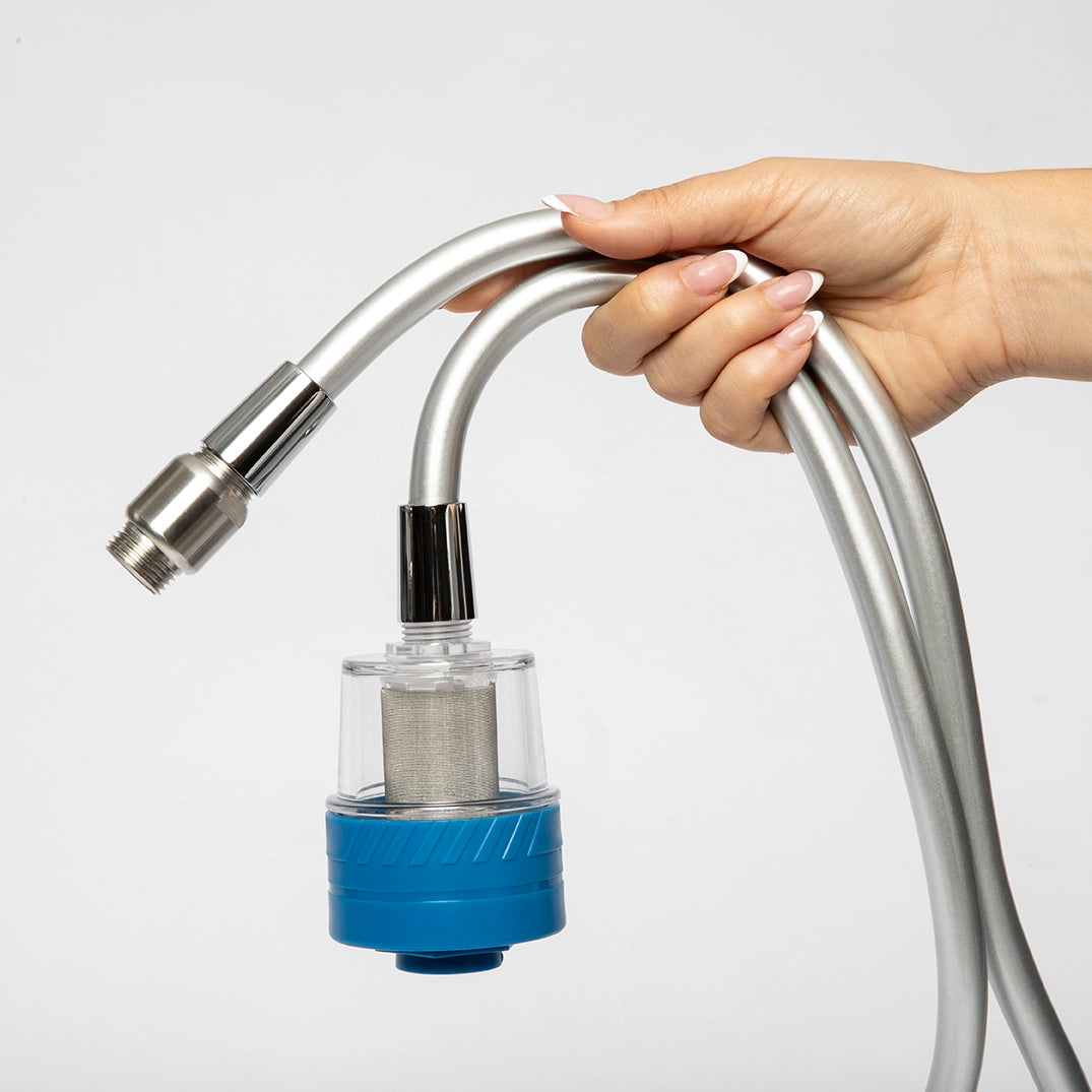 Hand holding the Revive hydrogen hose connector