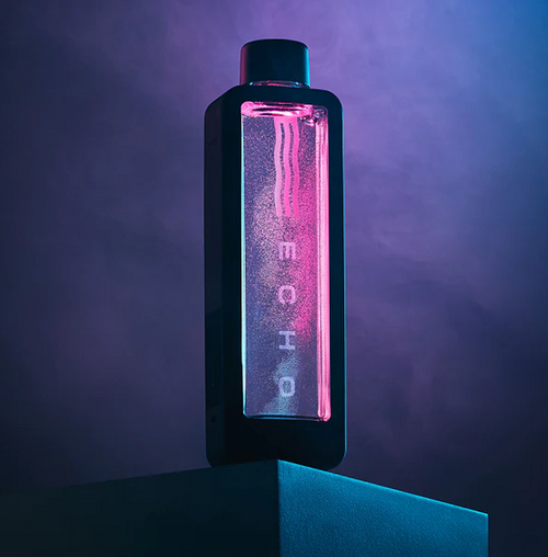 Hydrogen water flask with LED lighting on a pedestal, modern design, colored glow